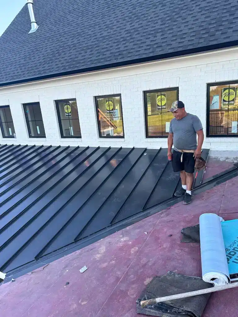 person standing on roof
