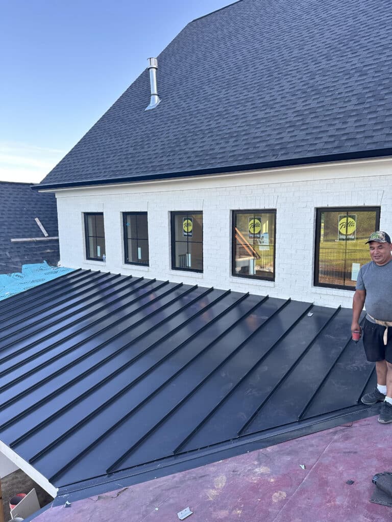 person standing on top of a roof
