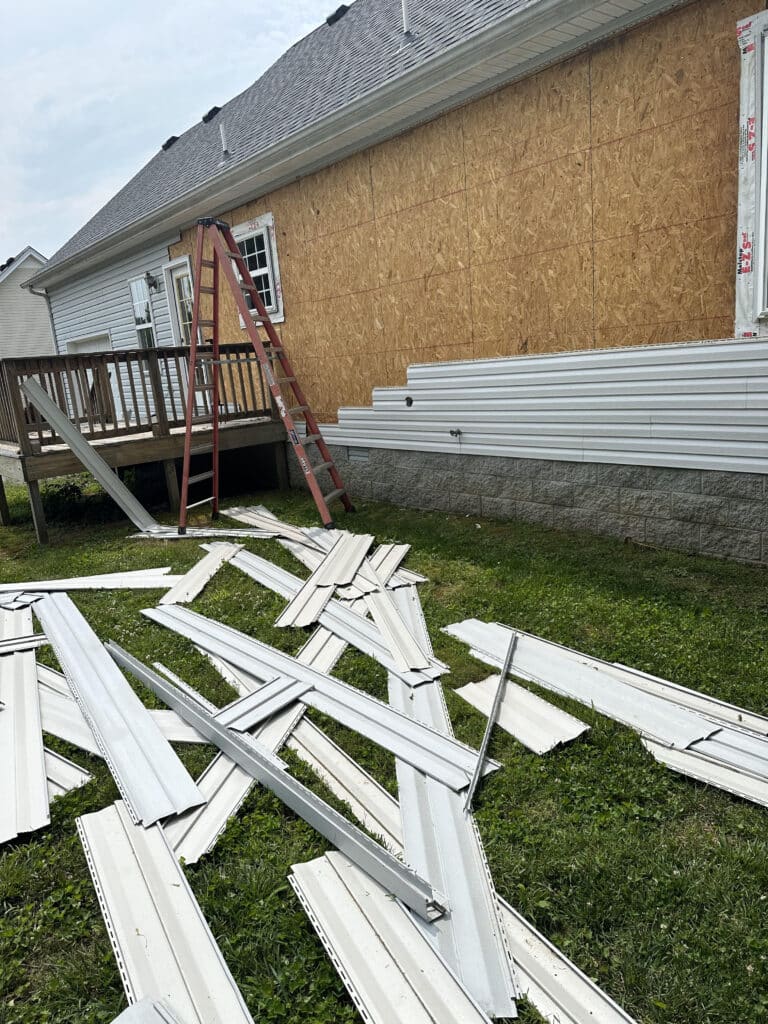 stripping off old siding